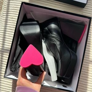black boots with heart shaped heel